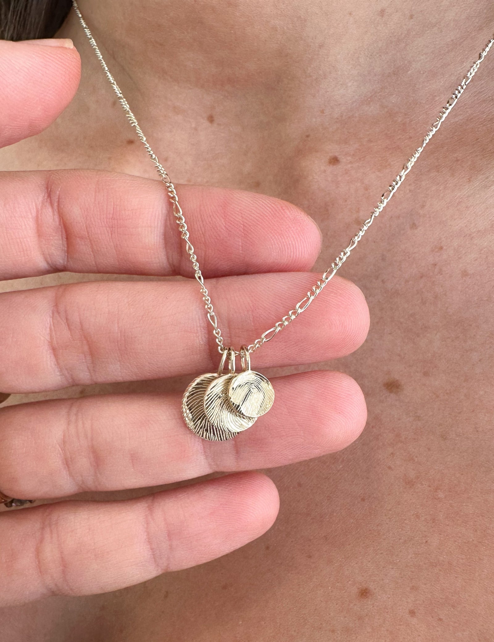 Waved Disc Imprint Pendant