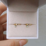 Dainty Topaz Huggies